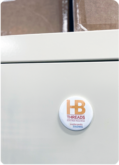 HB Threads white custom magnet on fridge